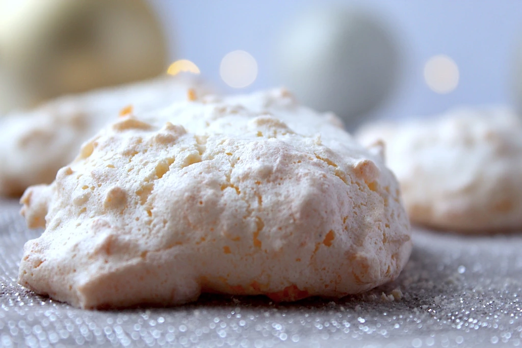 These cookies are light, airy, sweet, and irresistible! The delicate, crisp, snow-like meringue melts instantly on the first bite, leaving only the chewy coconutty center. 