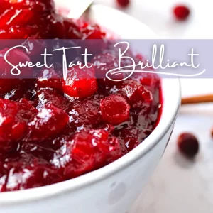 Sweet, Tart, Brilliant! A strikingly white bowl holds deep red, vibrant, spiced cranberry sauce.