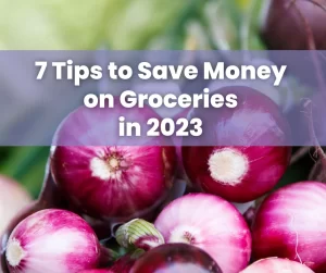 Purple onions are shown with fresh green veggies faded into the background. 7 Tips to Save Money on Groceries in 2023