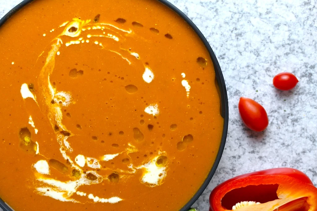 Beautiful arial photo with a delicious bowl of fresh roasted tomato soup